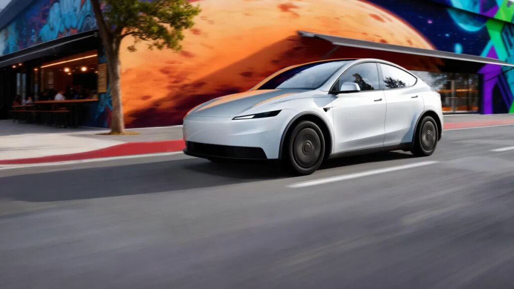 tesla-model-y-standard-model-in-white-driving-on-a-road-in-la.jpg