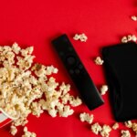gettyimages-1291761630-phone-remote-popcorn.jpg