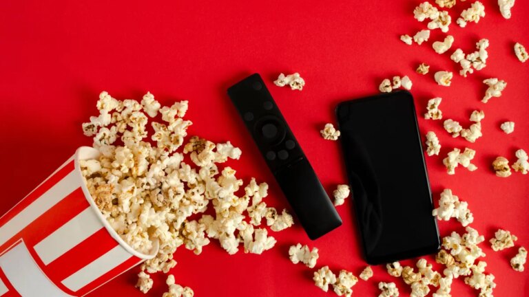 gettyimages-1291761630-phone-remote-popcorn.jpg