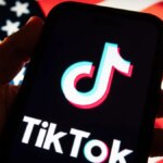 tiktok-logo-and-american-flag-gettyimages-2194103715.jpg