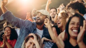 group-of-supporters-taking-selfie-watching-a-football-match-jacob-lund-adobe-stock.jpg
