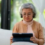 older-woman-on-tablet-gettyimages-2184879678.jpg