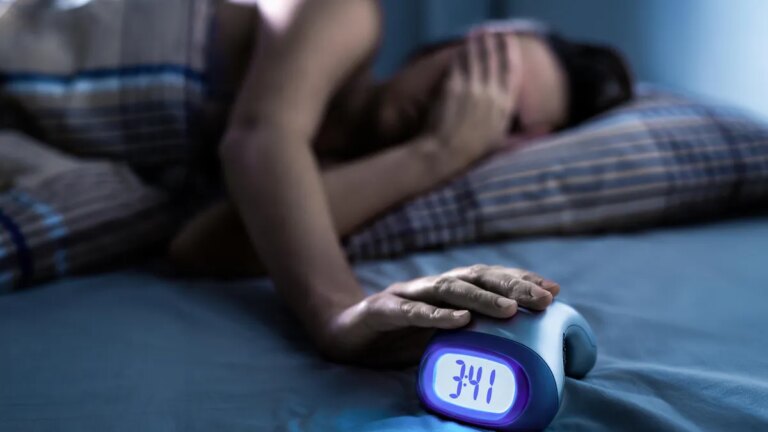 sleeping-alarm-clock-late-gettyimages-2246511079.jpg